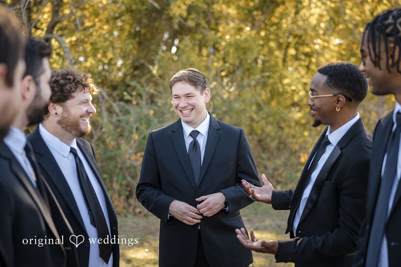 A joyful portrait of the groom and his groomsmen