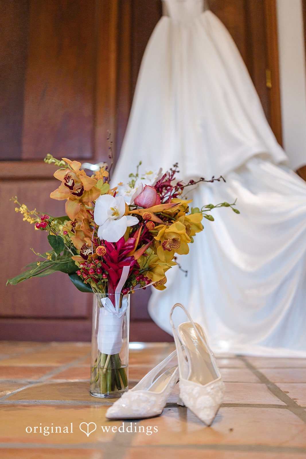 Bridal bouquet and wedding shoes styled indoors with soft natural light