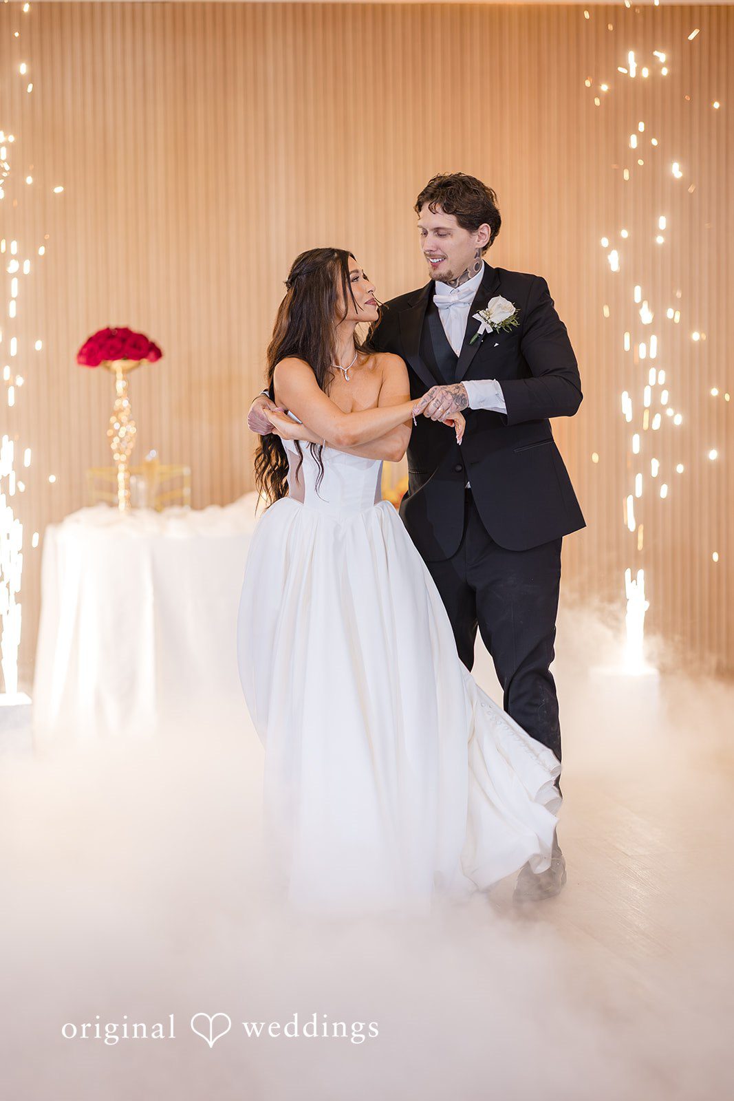 Playful first dance moment with fog effect, Miami Wedding Photography style