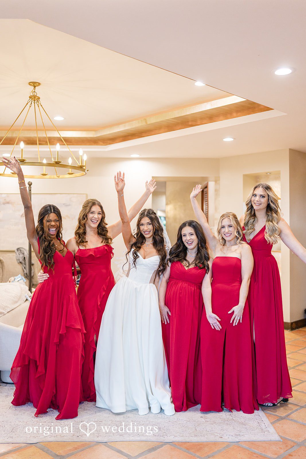 Indoor group photo of the wedding party at the reception venue