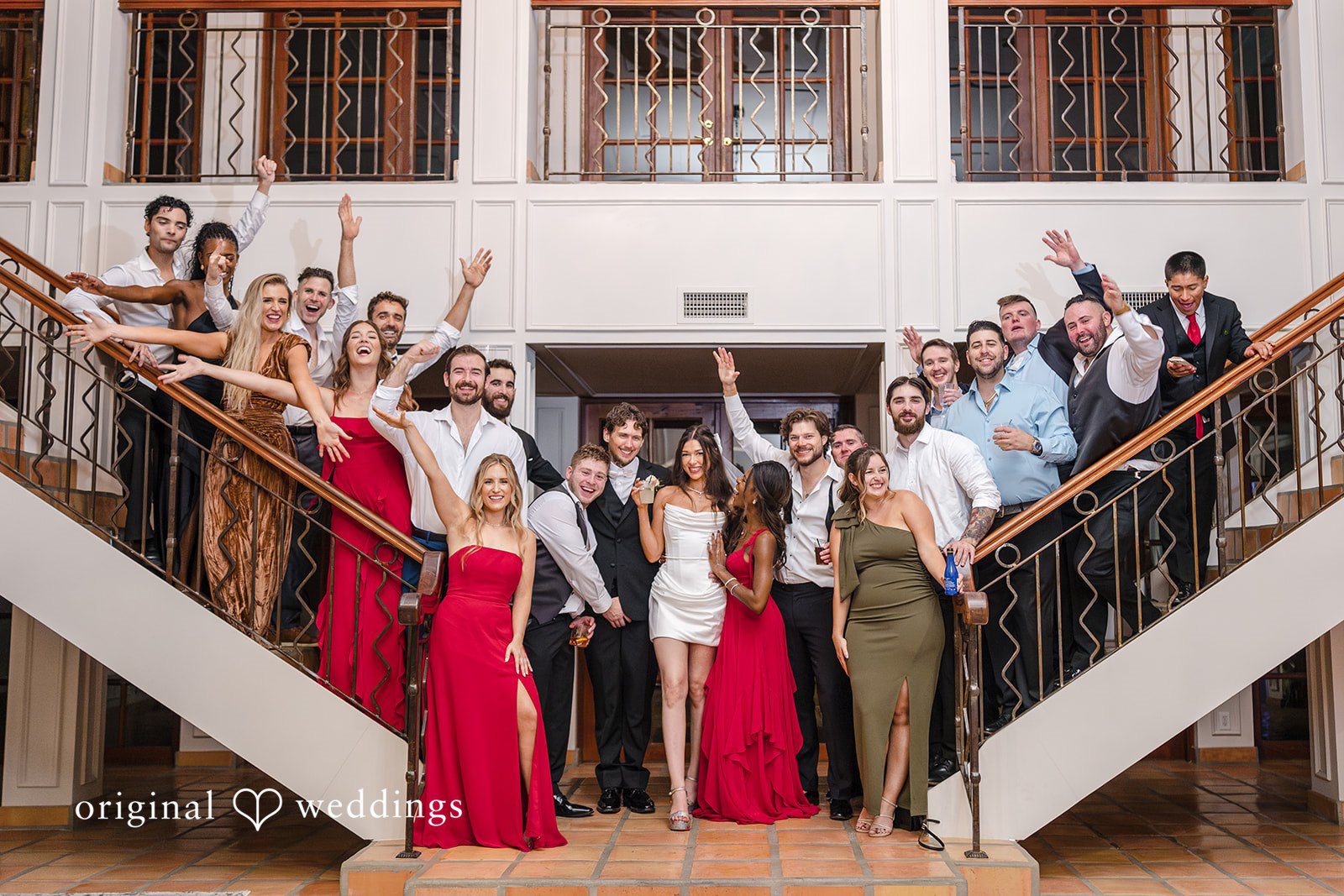 Large group celebration photo on a staircase, Miami Wedding Photography moment