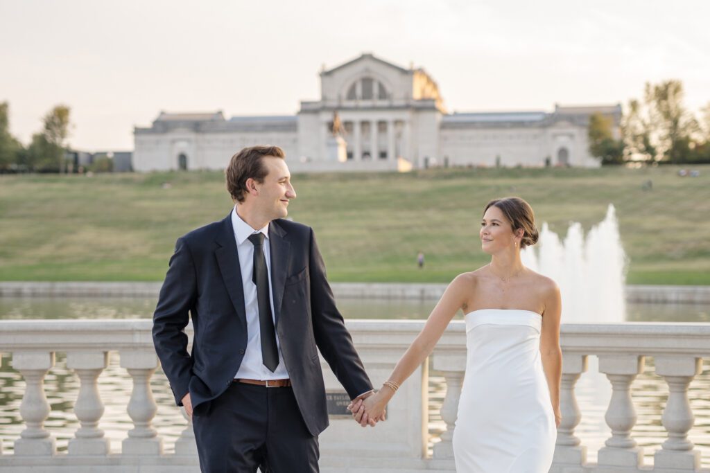 st-louis-wedding-photographer-and-videographer-3 couple holding hands and smiling at unique wedding venues st louis