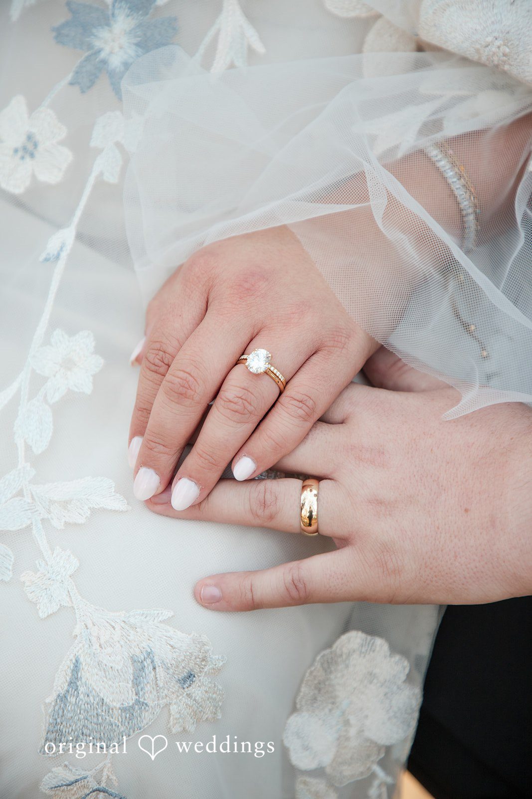 Kelsey + Riley Close-up of hands showing wedding rings in a soft romantic moment, captured by Austin wedding photographers.
