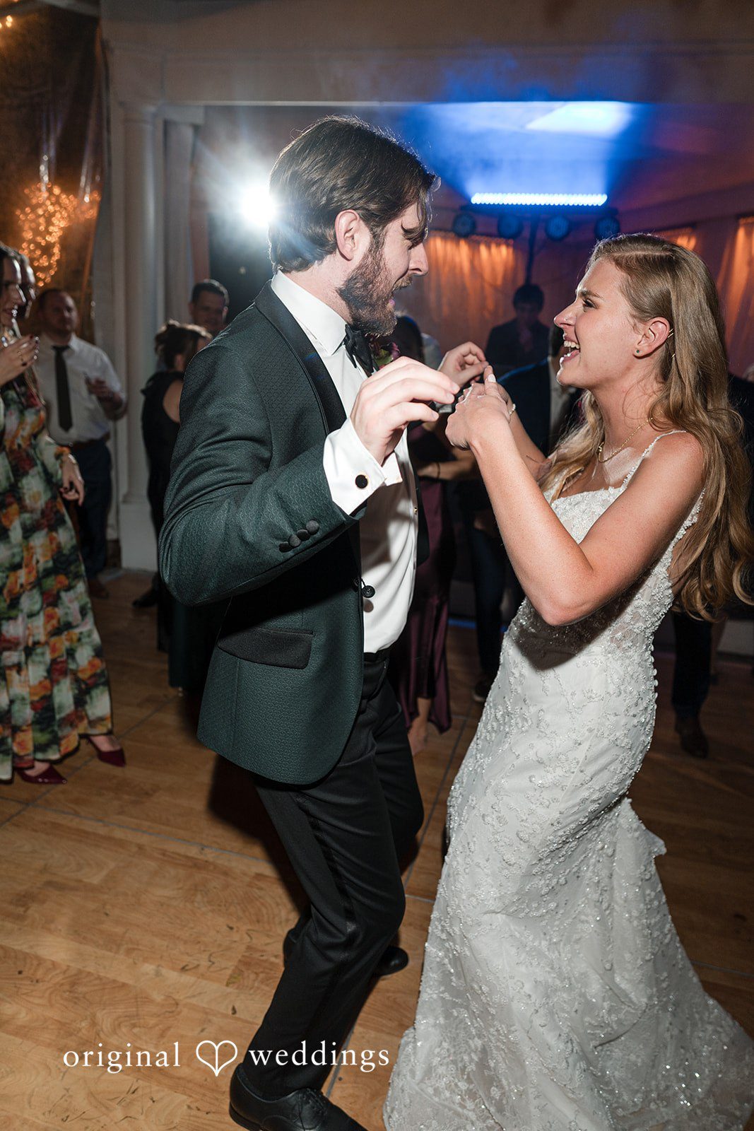 The couple's joyful dance time at their wedding reception