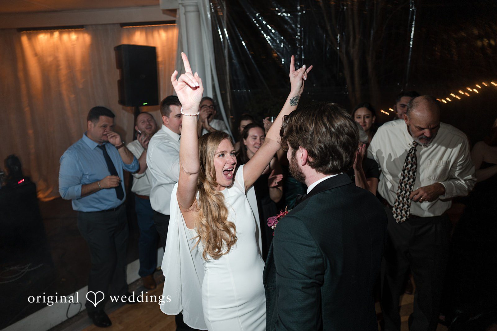 A happy bride reliving the moment