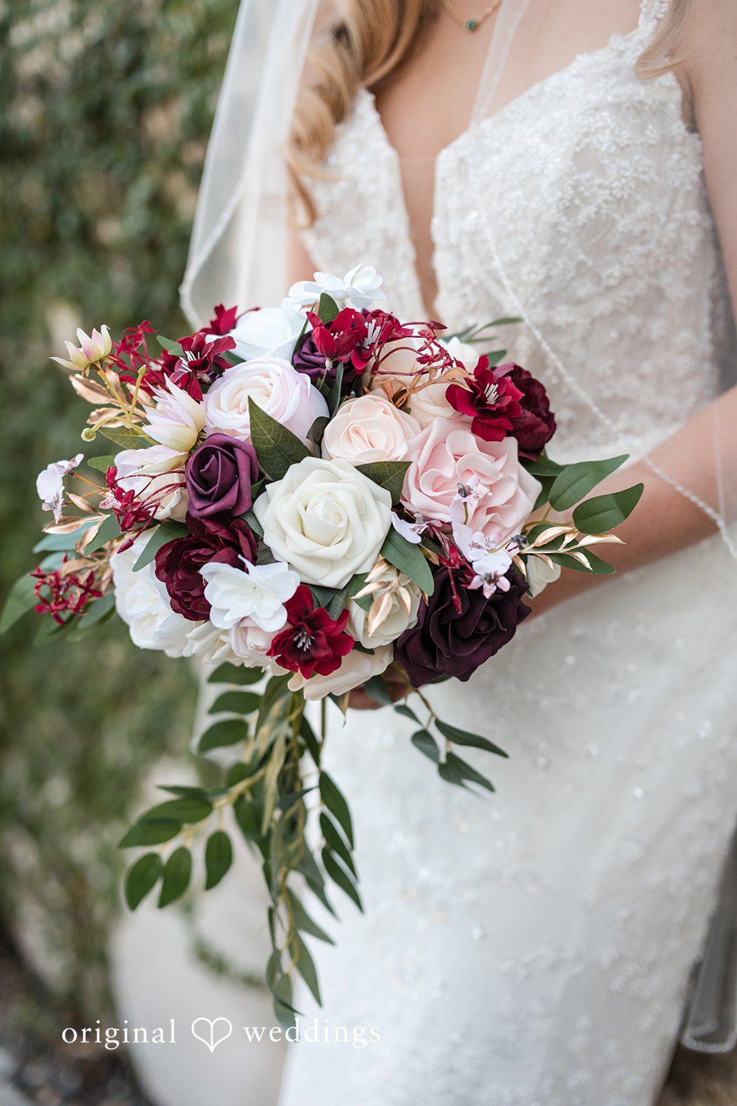 A close-up shot of the bride holding her huge bouquet