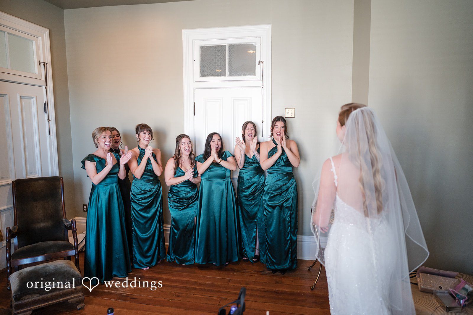 The moment the bride reveals herself to her bridesmaids