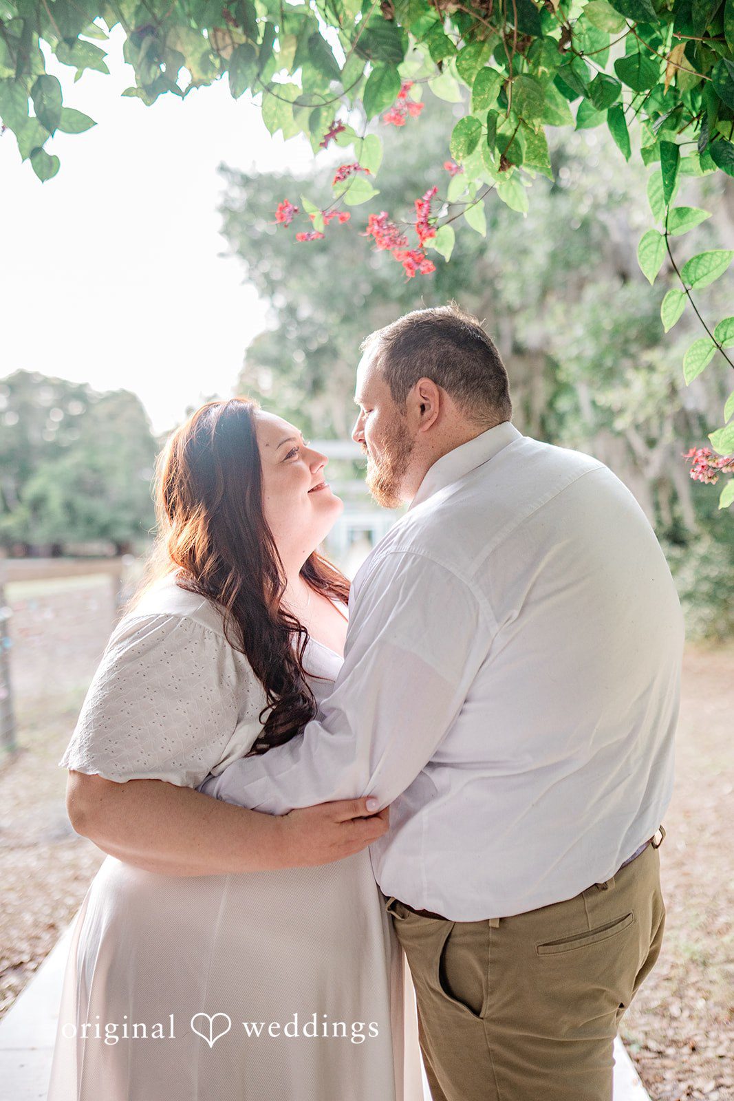 A beautiful picture of couple holding hands and looking into each other’s eyes