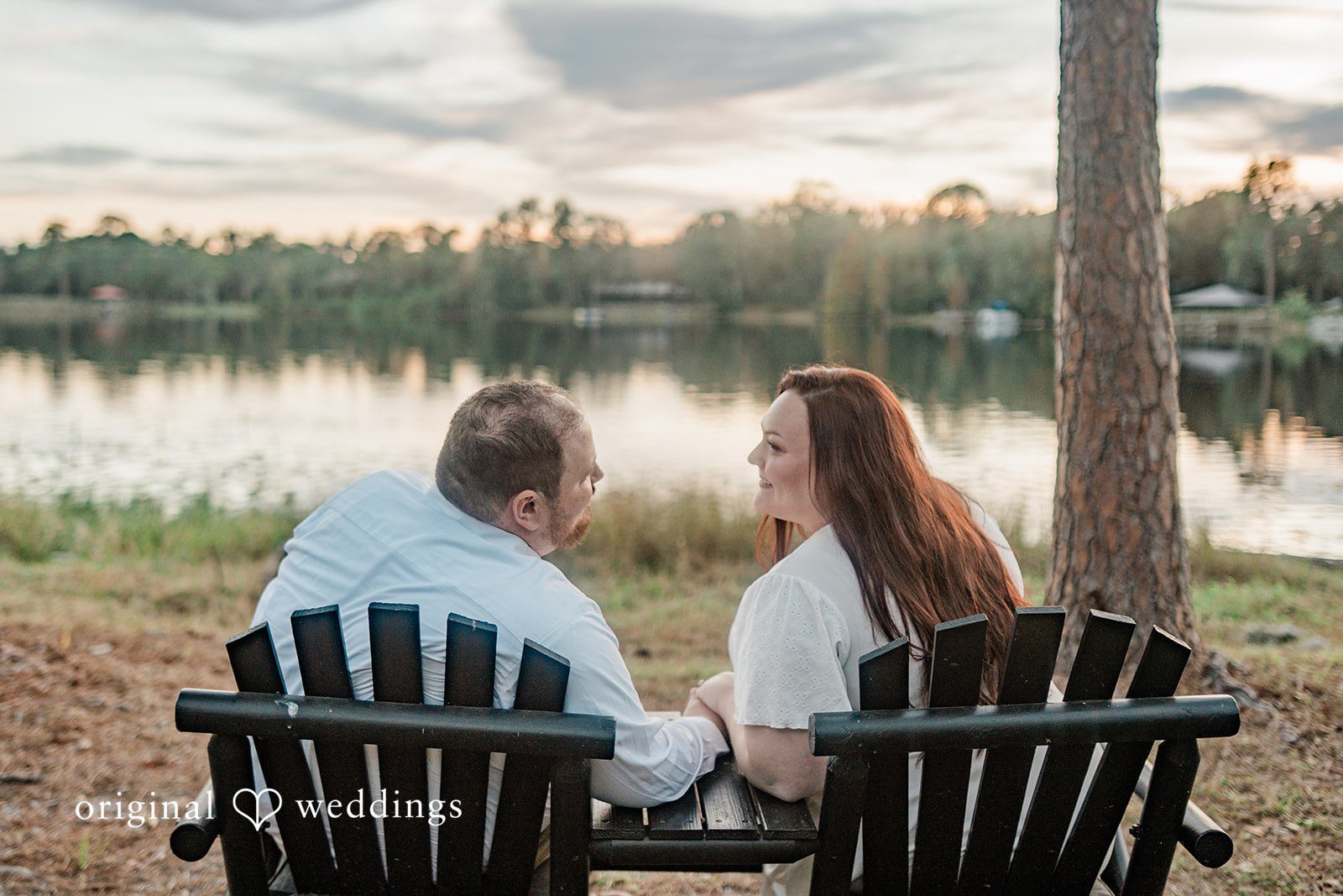 Couple sitting together on chairs at The Barn at Crescent Lake