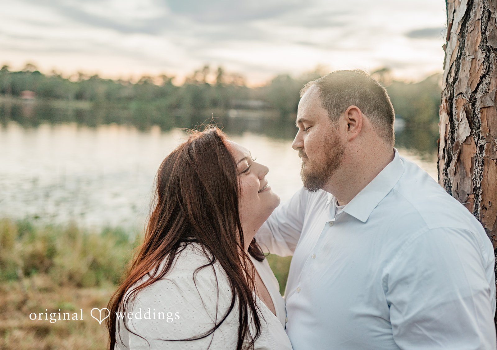 Couple looking lovingly into each other’s eyes at The Barn at Crescent Lake in Odessa
