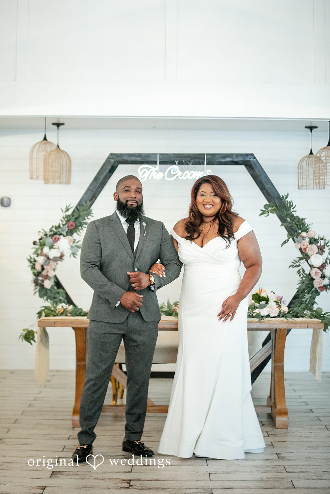 A portrait of the couple at their wedding reception
