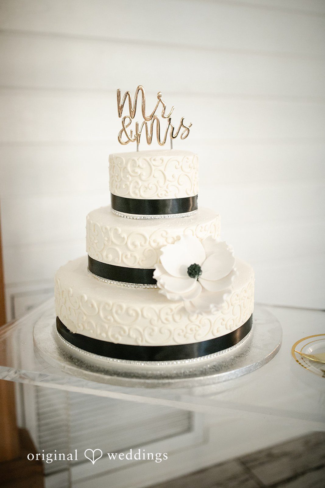 A beautiful wedding cake at The Black Barn wedding reception