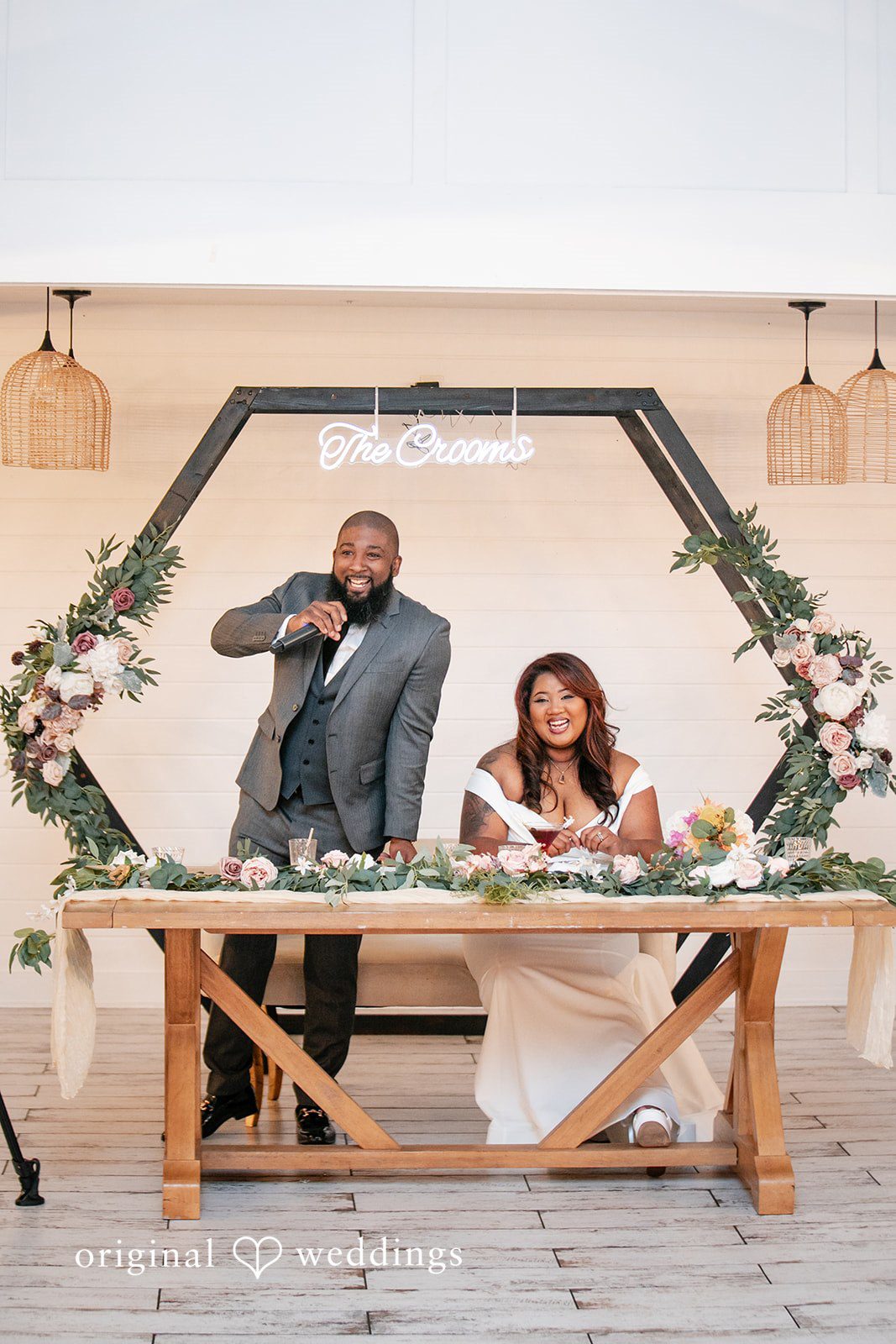The groom happily gives his speech