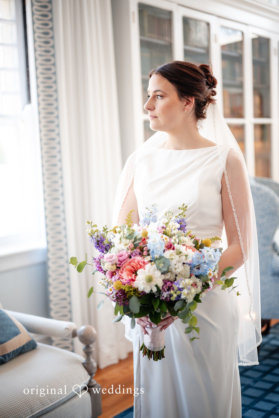 Beautiful picture of bride holding flower bouquet