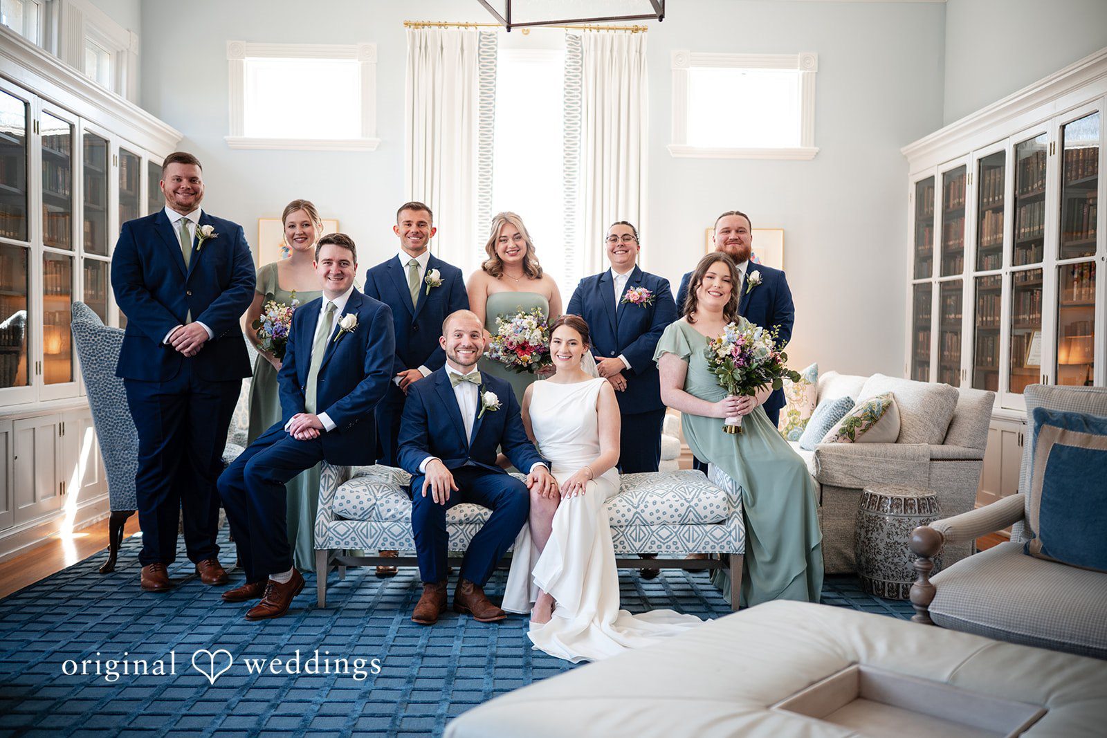 Lovely picture of couple with bridesmaids and groomsmen at The Glendale Lyceum by Cincinnati wedding photographers from original weddings