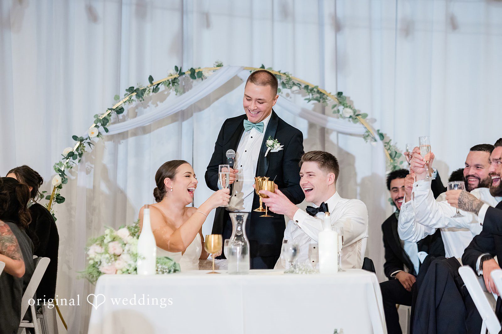 Lovely couple sharing their happiness with guests