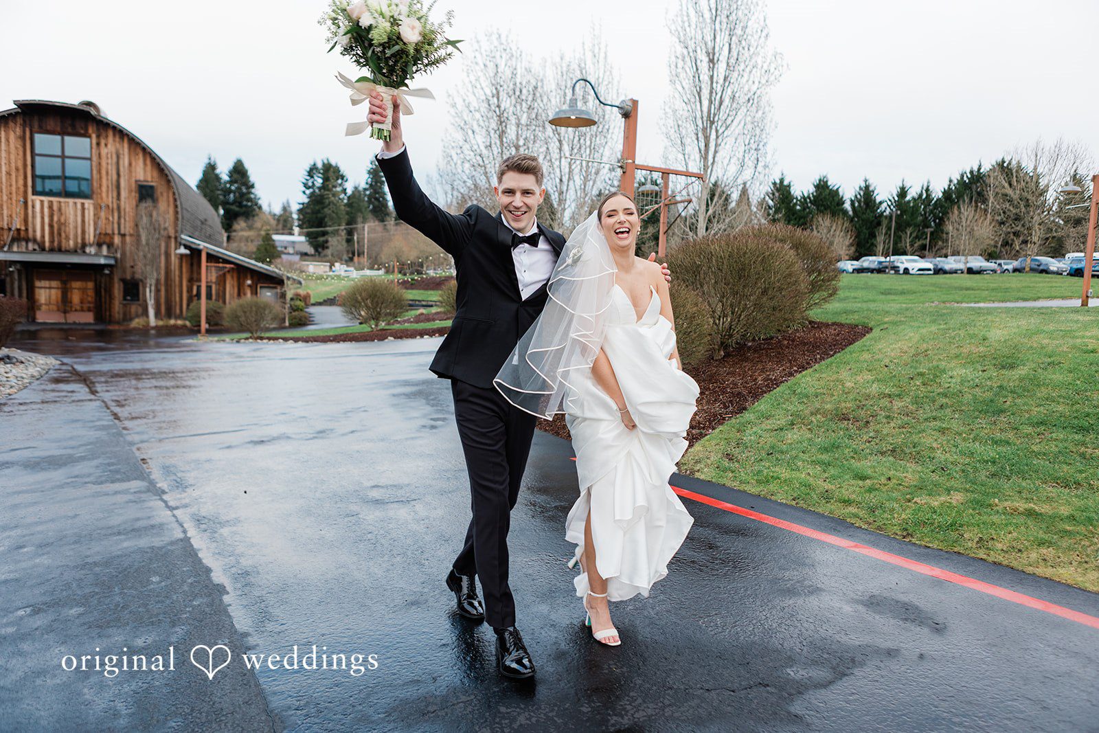 Newly married couple walking happily at The Olson Mansion