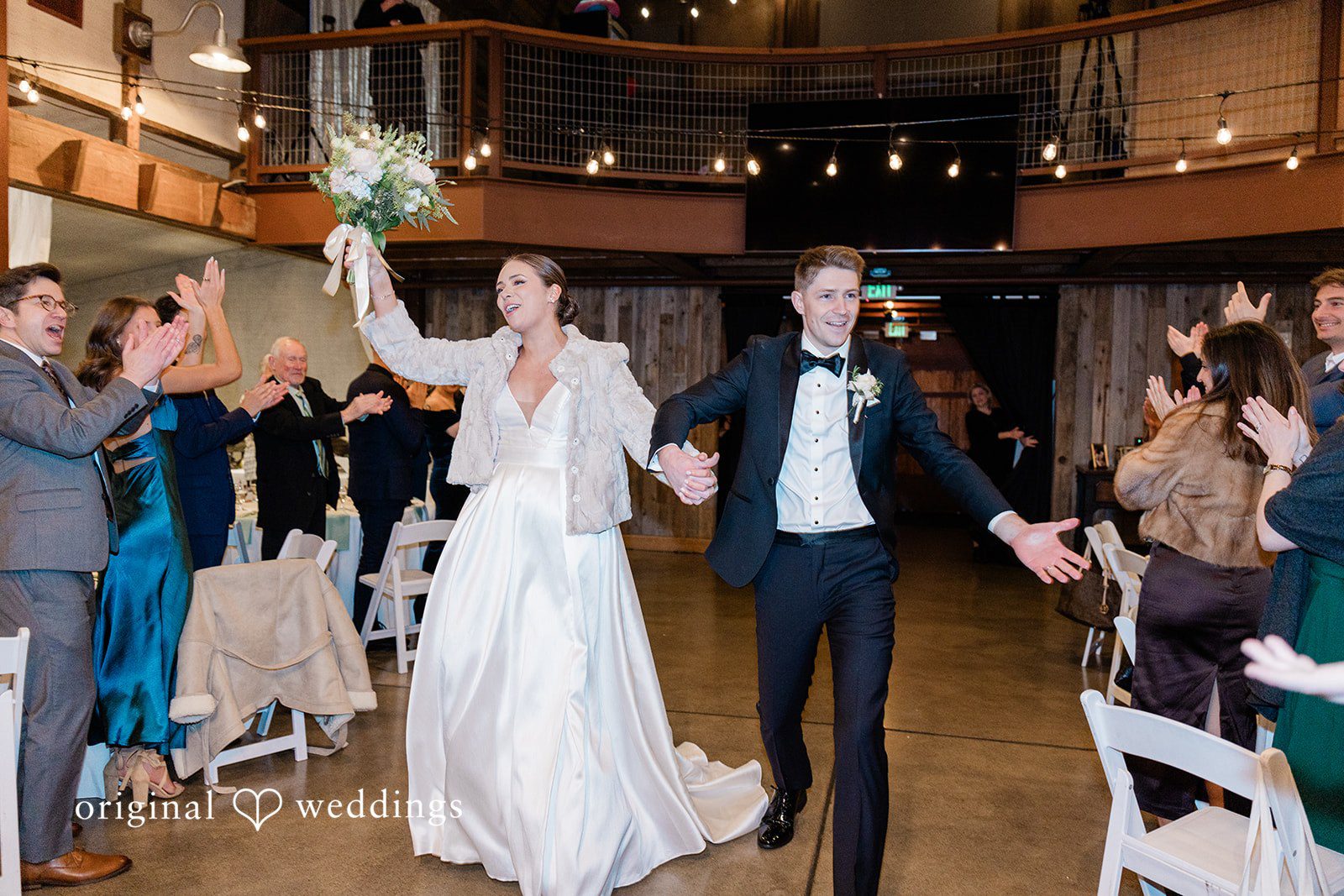 Couple expressing their joy after wedding ceremony