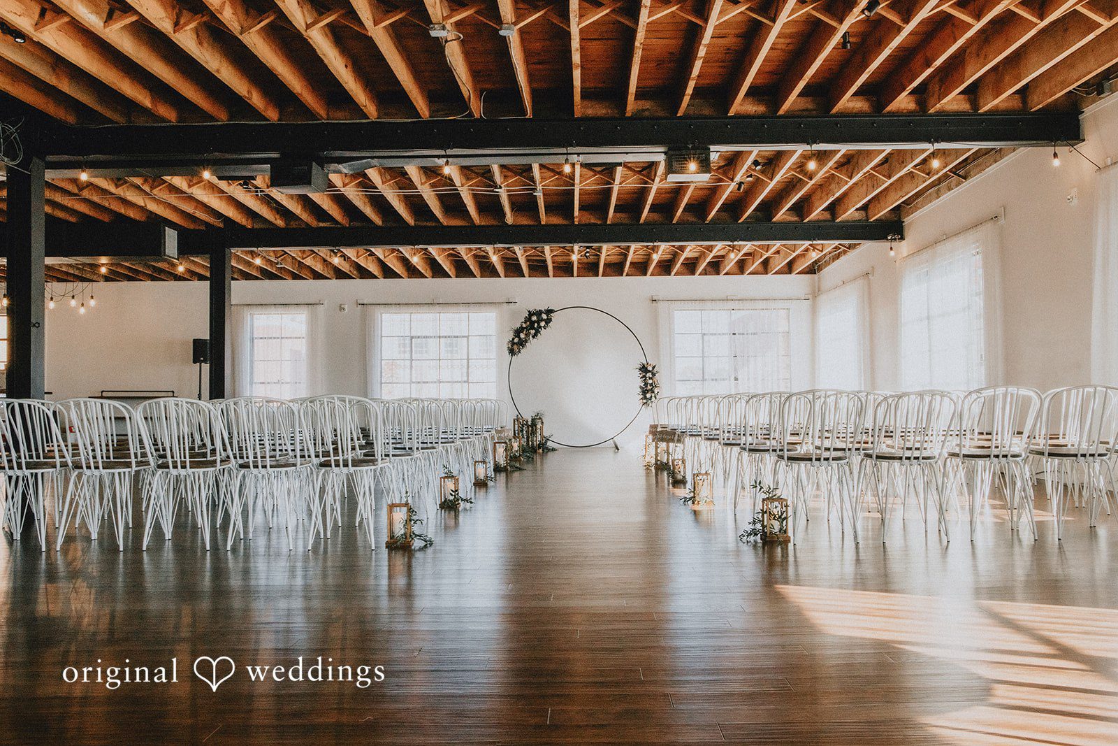 Dianna + Devin The beautiful indoor ceremony space at The Refinery wedding venue