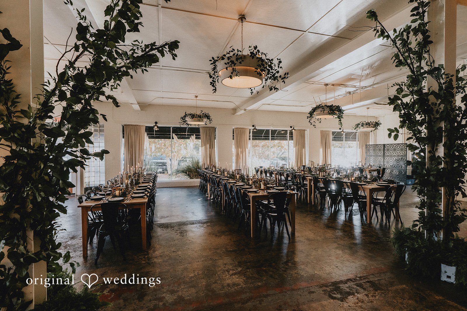 Dianna + Devin The beautifully decorated tables at the wedding reception hall