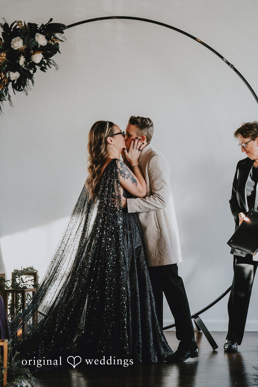 Dianna + Devin The couple shares a kiss to seal their union