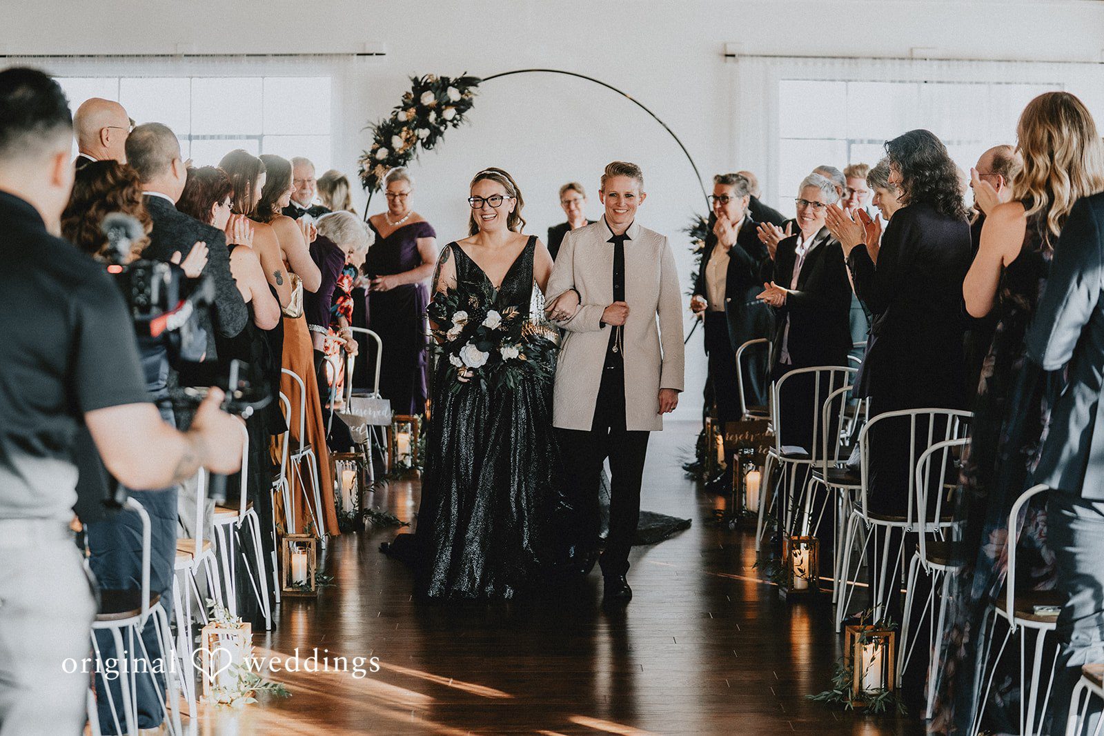 Dianna + Devin A joyful exit of the couple from the wedding ceremony hall