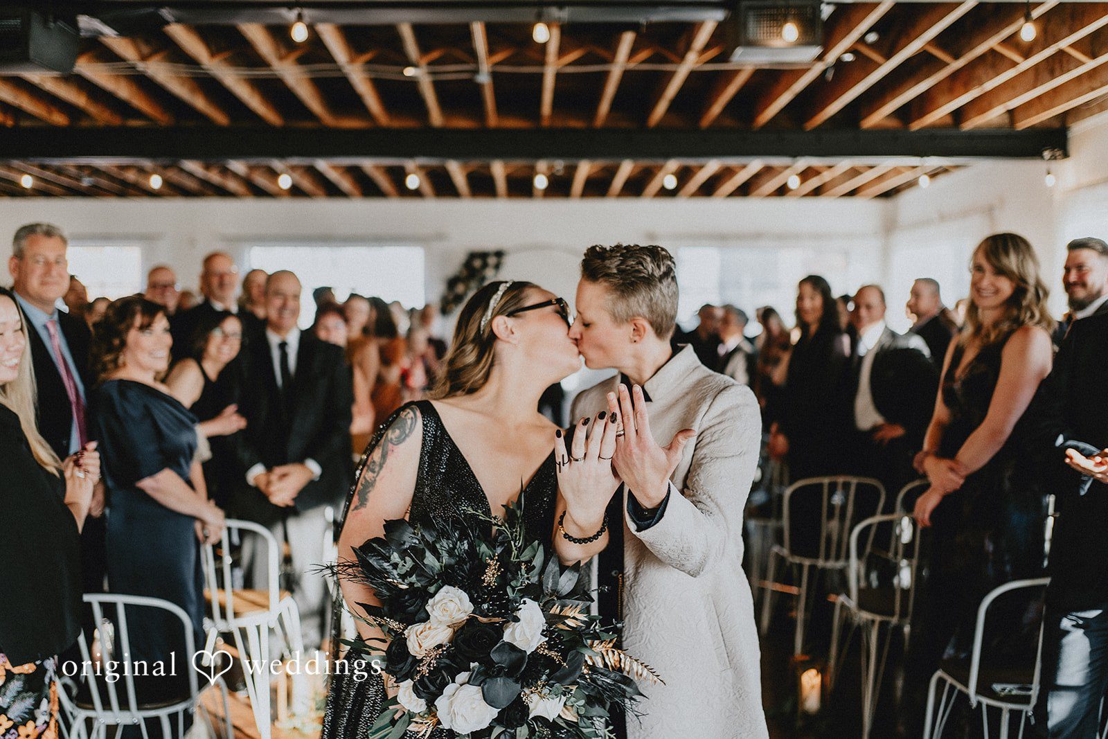 Dianna + Devin The bride and groom shares a romantic kiss