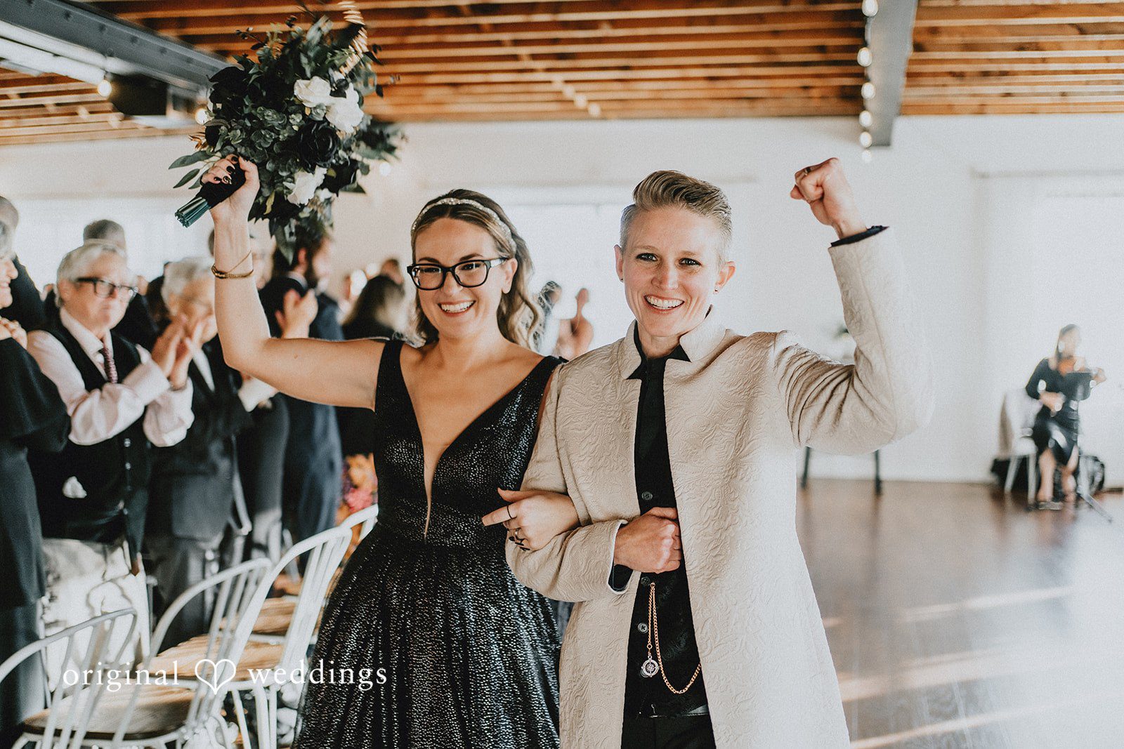Dianna + Devin A joyful portrait of the couple after their wedding ceremony
