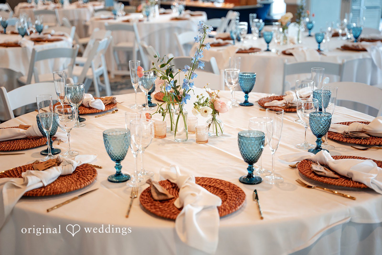 Wedding table setup with glasses ready for guests