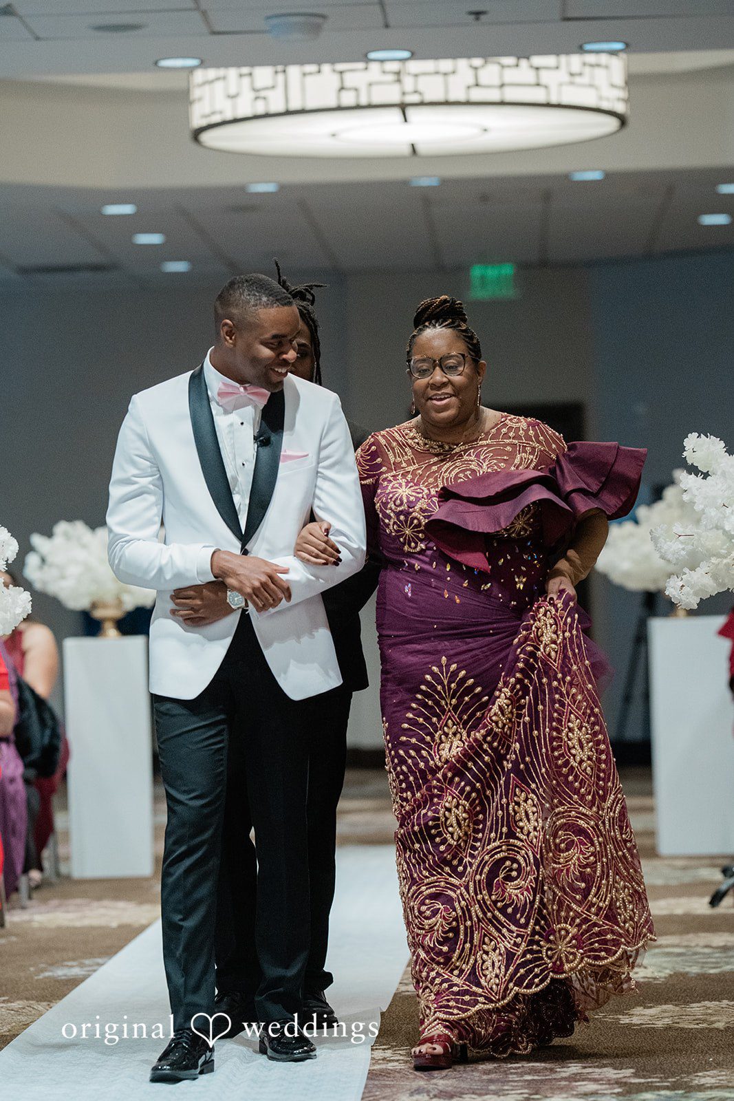 Lovely picture of groom walking down the aisle