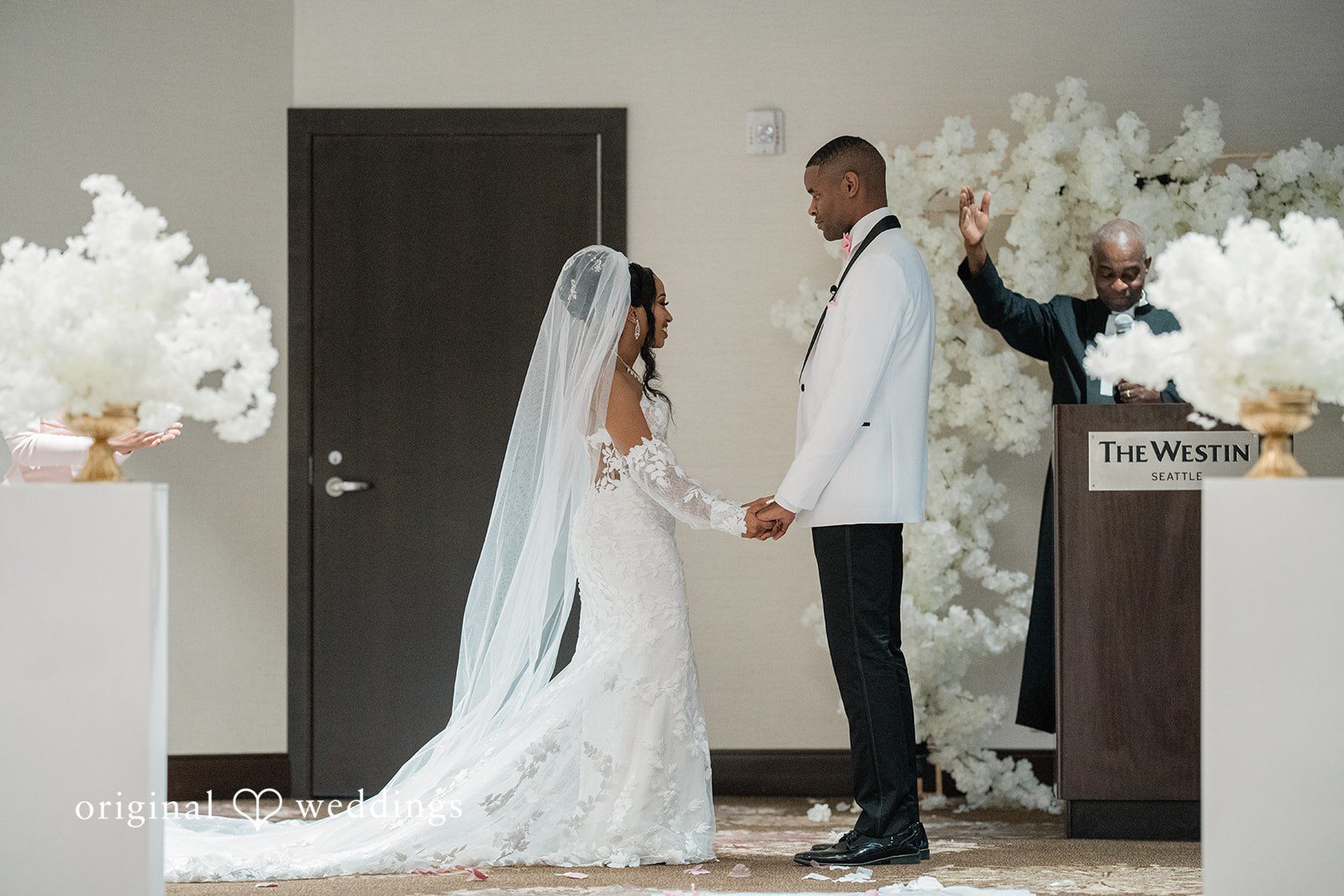 Beautiful picture of couple exchanging vows during ceremony