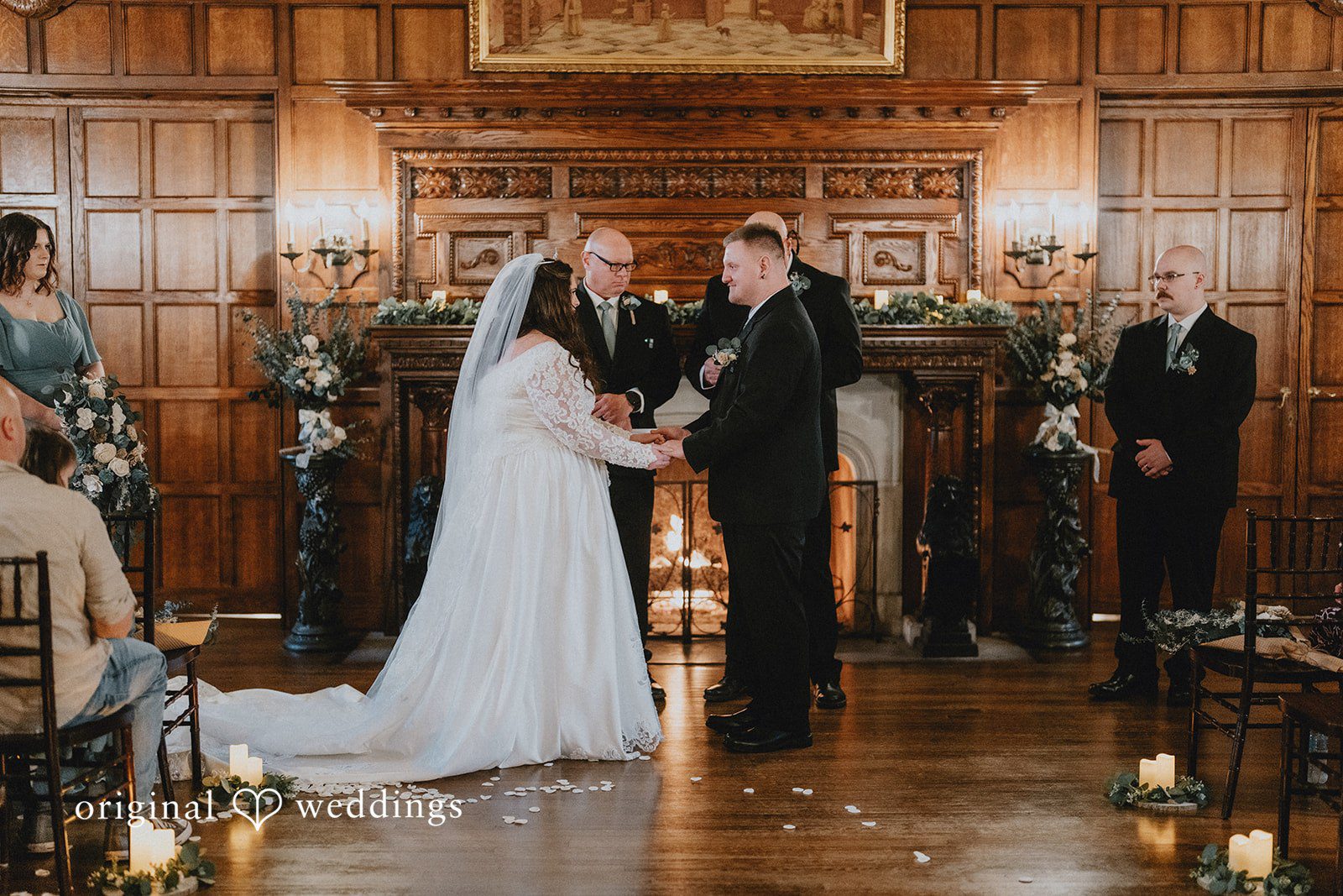 Kaydee + Jameson Wedding couple sharing a loving moment holding hands at Thornewood Castle