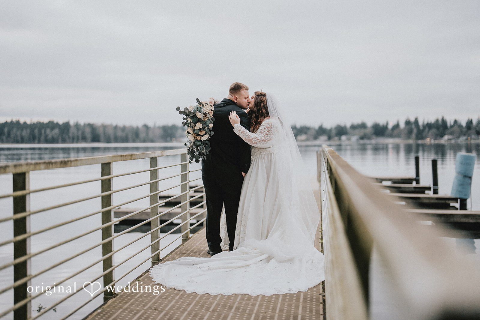 Kaydee + Jameson Romantic moment of bride and groom kiss