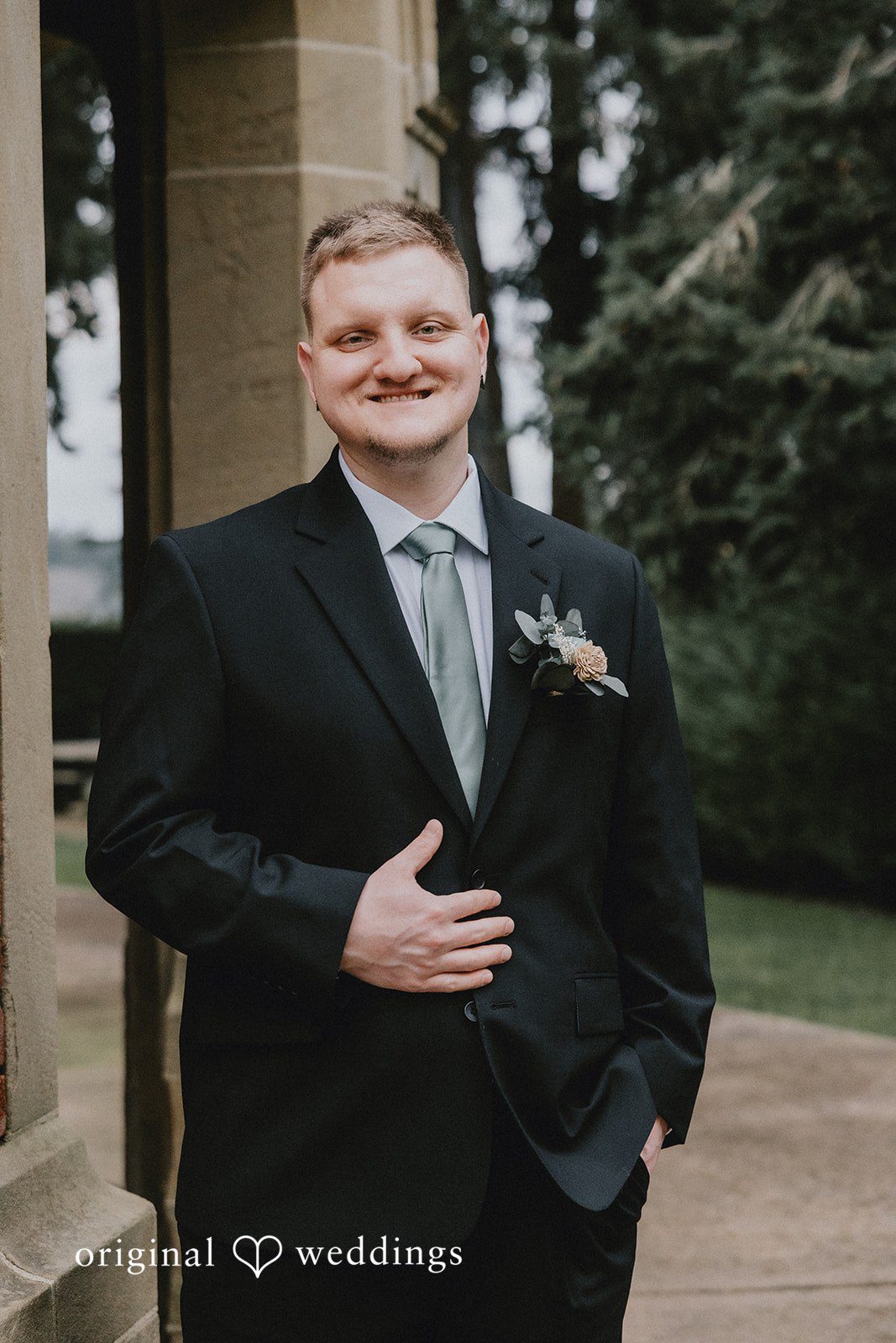 Kaydee + Jameson Stylish groom portrait at Thornewood Castle