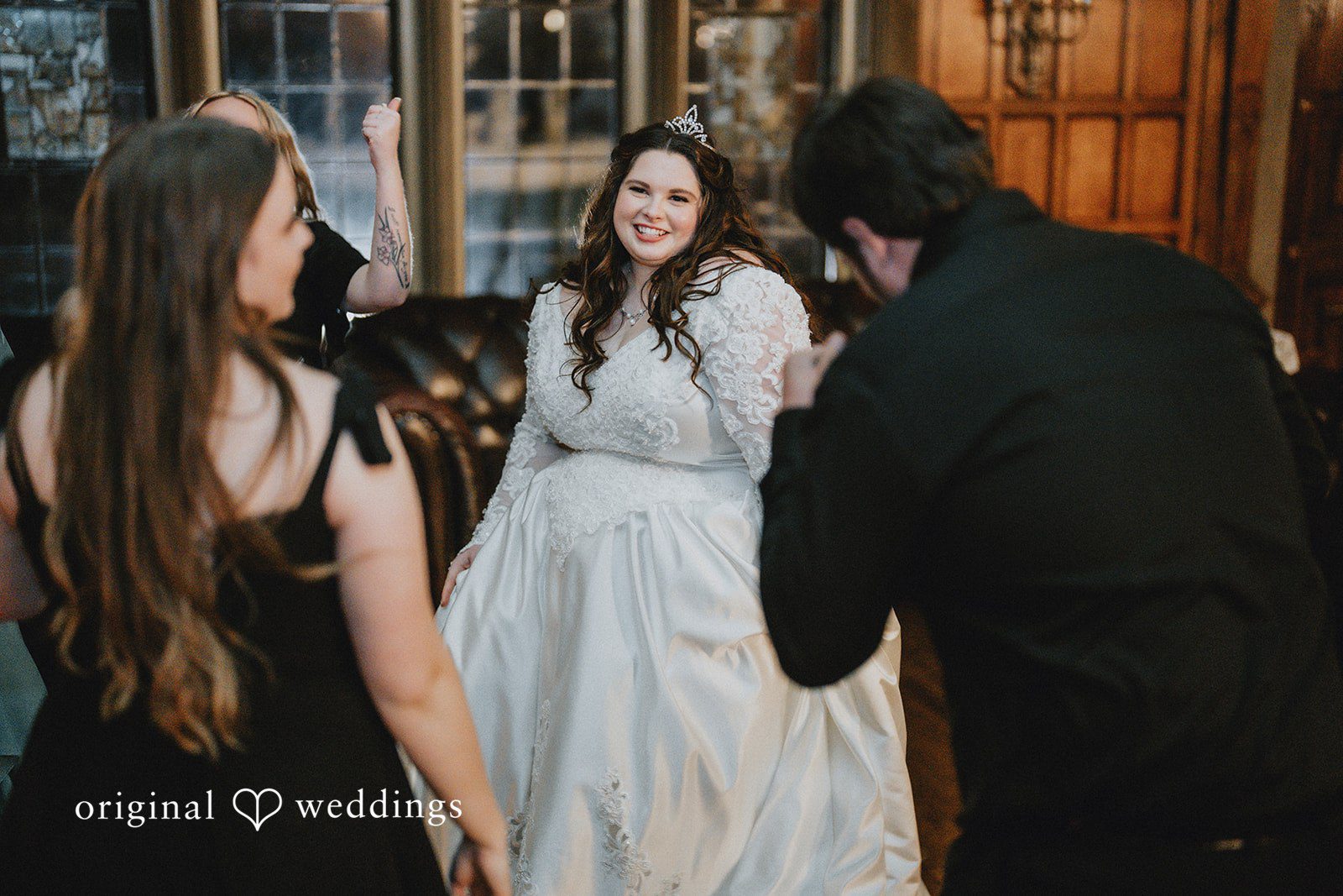 Kaydee + Jameson Smiling bride dancing joyfully during wedding photo shoot