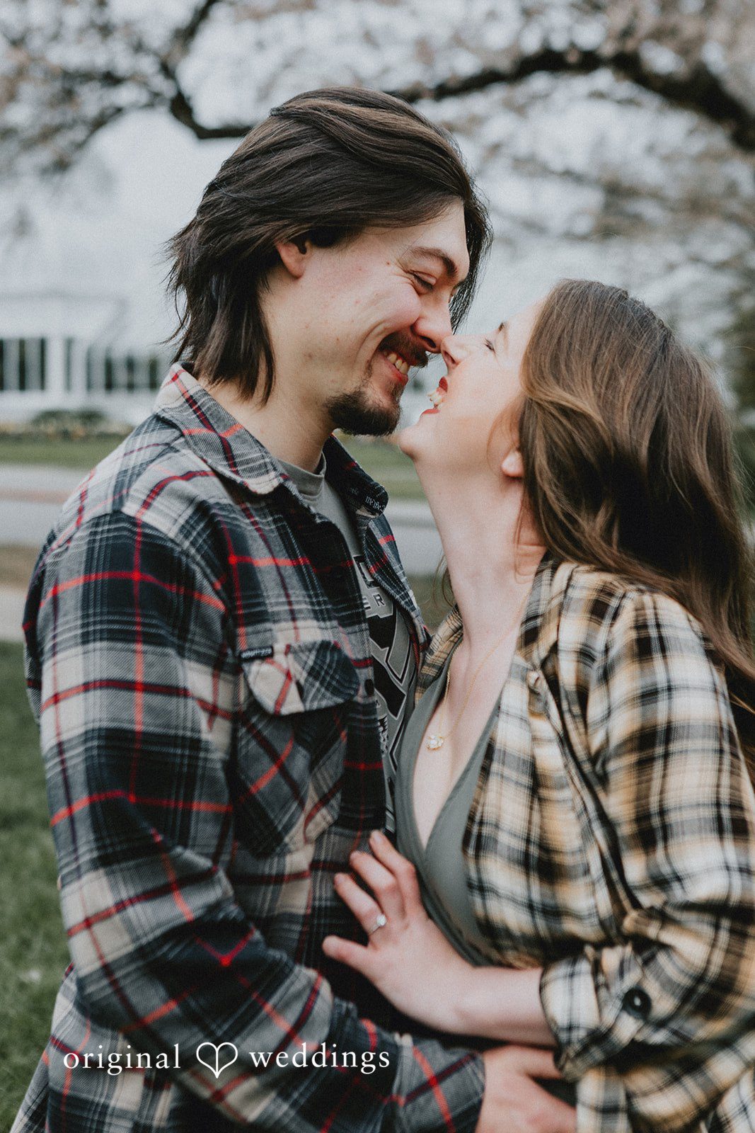 Lovely couple smiling while posing at Volunteer Park