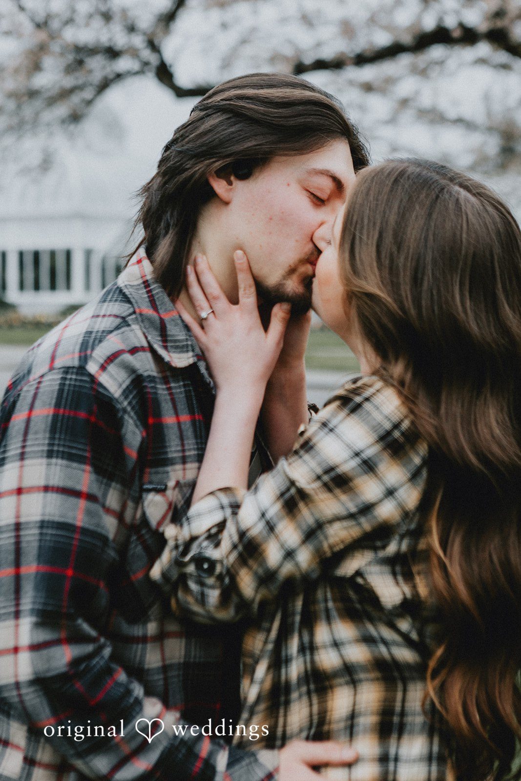 Romantic moment of couple kissing at Volunteer Park