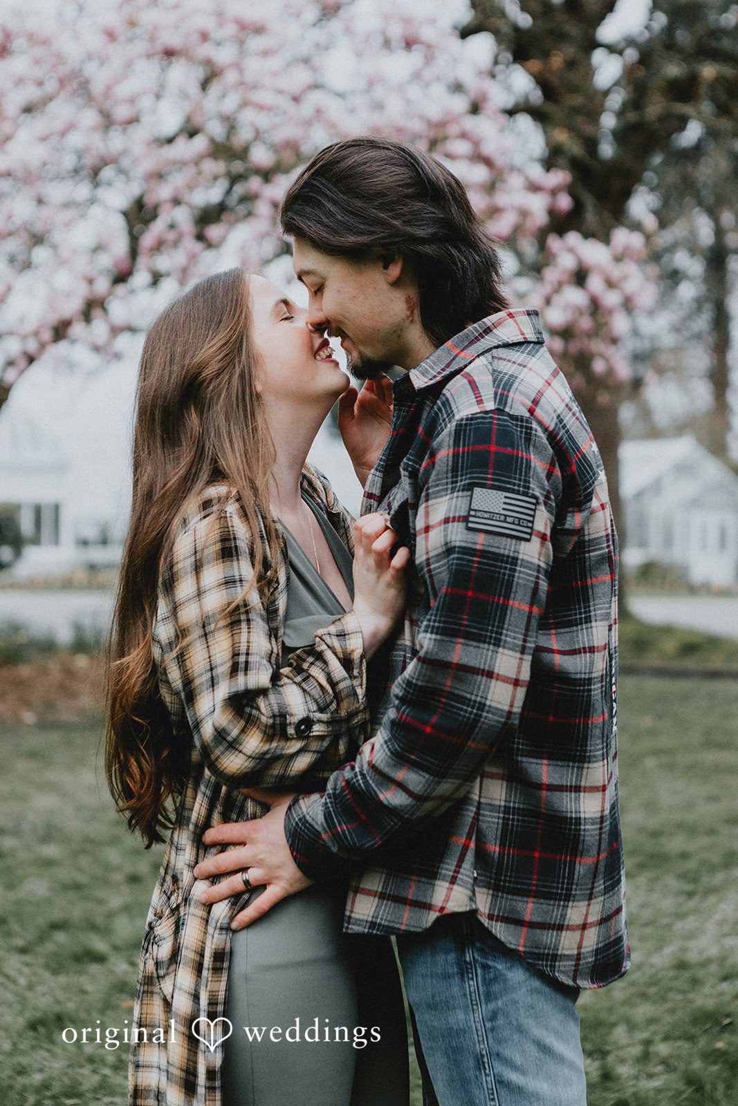 Romantic moment of couple standing close together at Volunteer Park