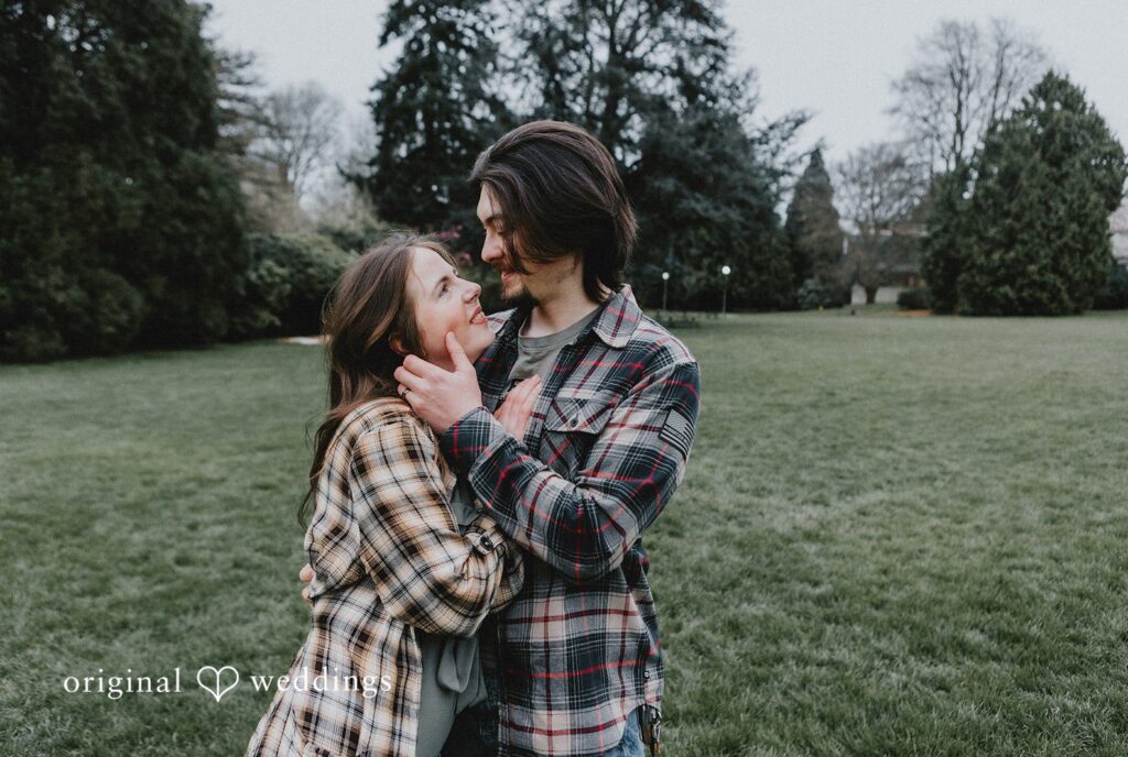 Engagement photography services by Original Weddings capturing happy couple smiling at Volunteer Park