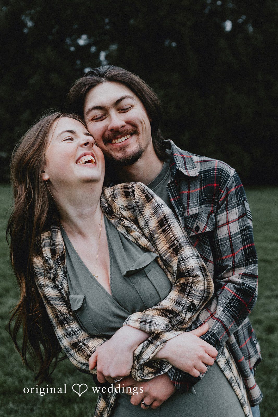 Romantic moment of couple hugging and smiling at Volunteer Park