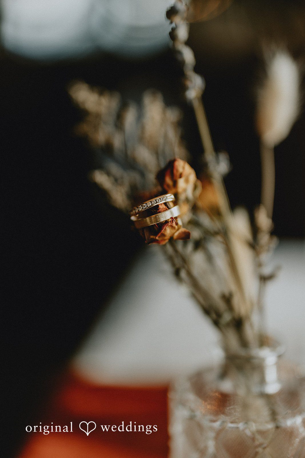 Parsa + Kiley A close-up of dried flowers in a glass vase adds a nostalgic touch.