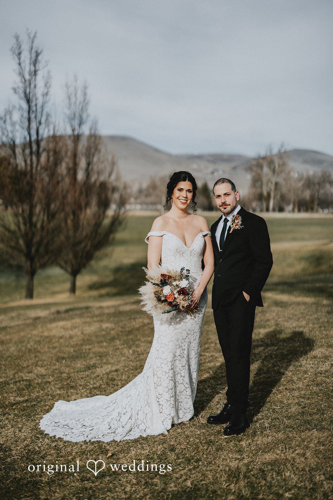 Parsa + Kiley The couple smiles at the camera, capturing their happiness.