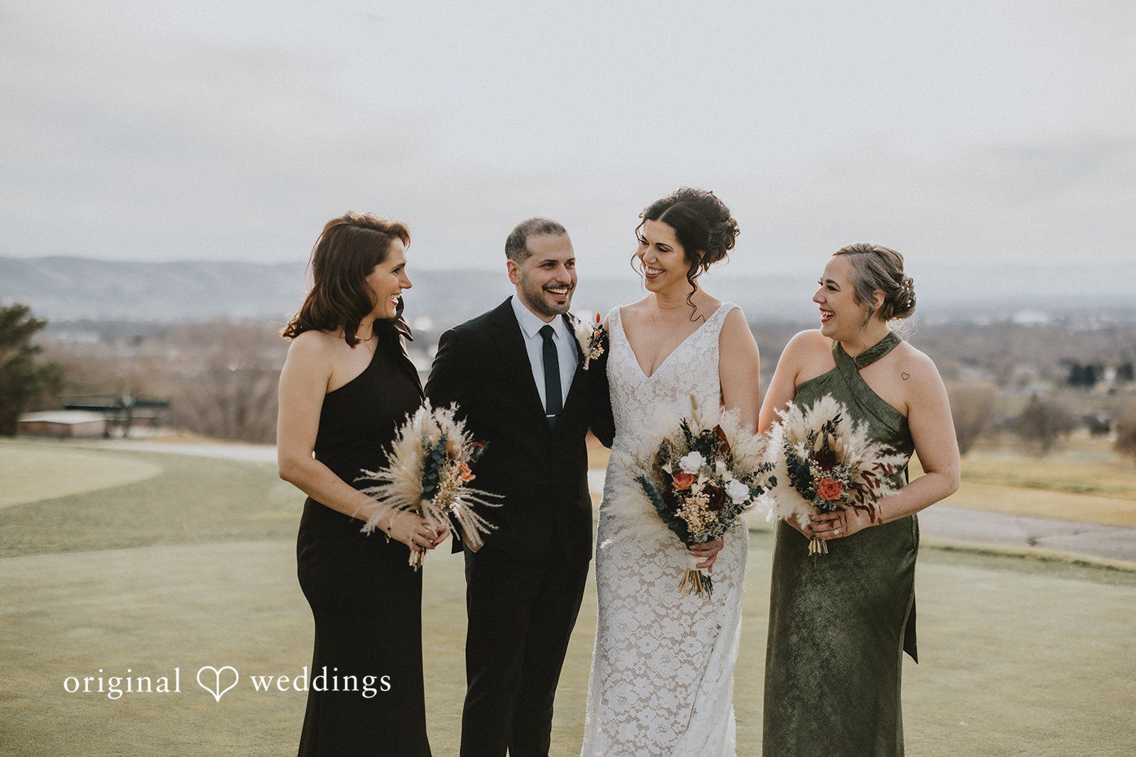 Parsa + Kiley The bride shares a joyful moment with her friends.