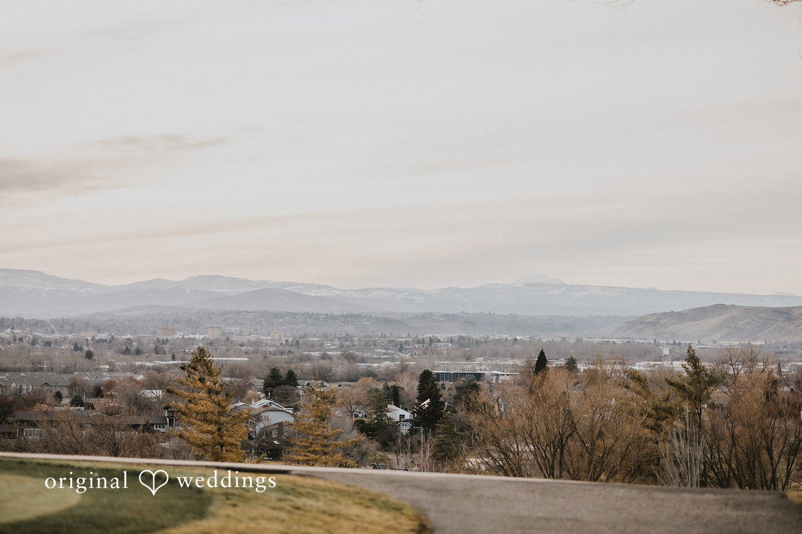 Parsa + Kiley Rolling hills in the background create a peaceful wedding atmosphere.