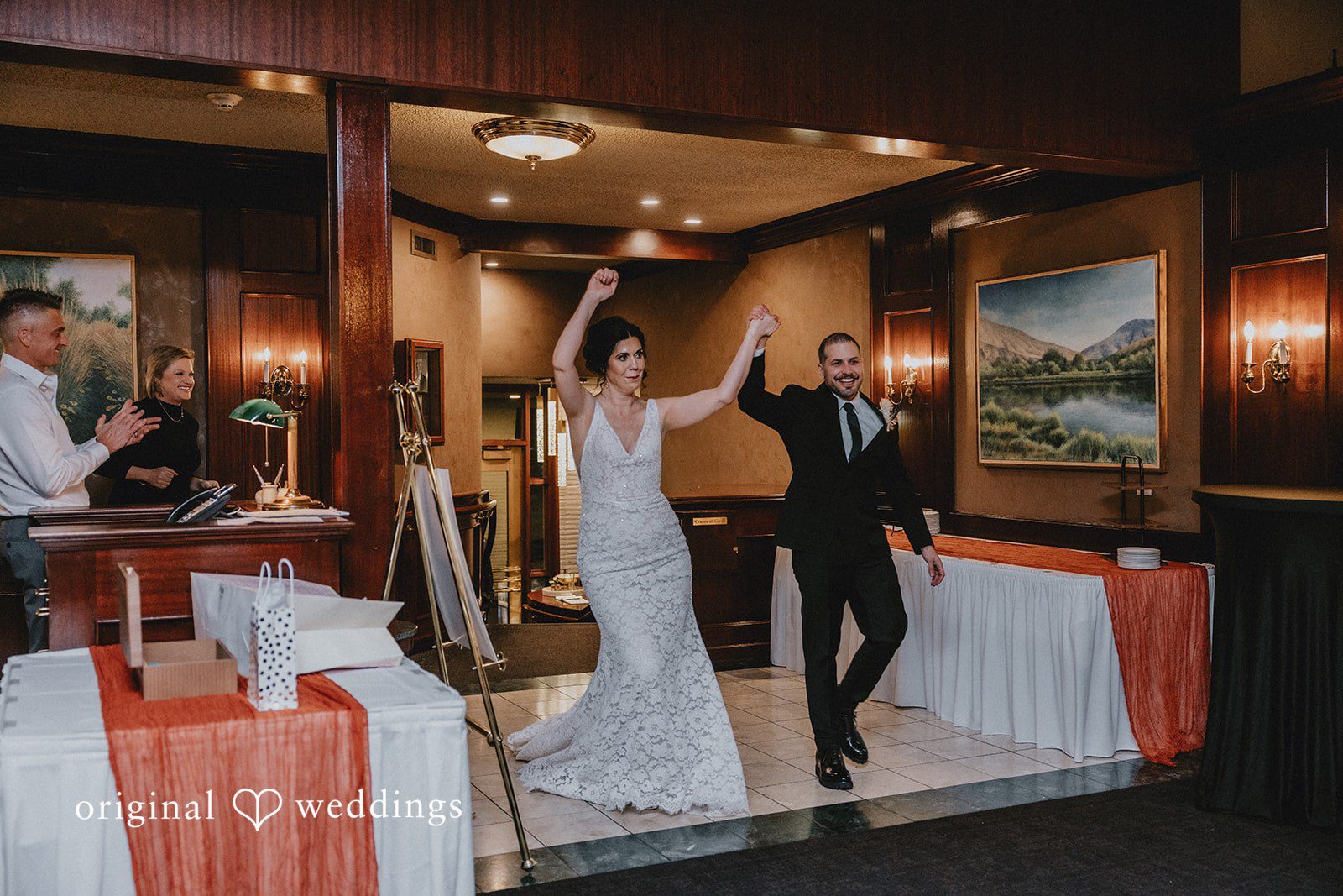 Parsa + Kiley The couple enters the reception and is welcomed with applause.