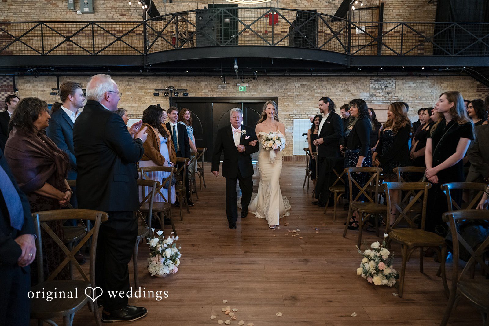 Bride walking down the aisle with her father