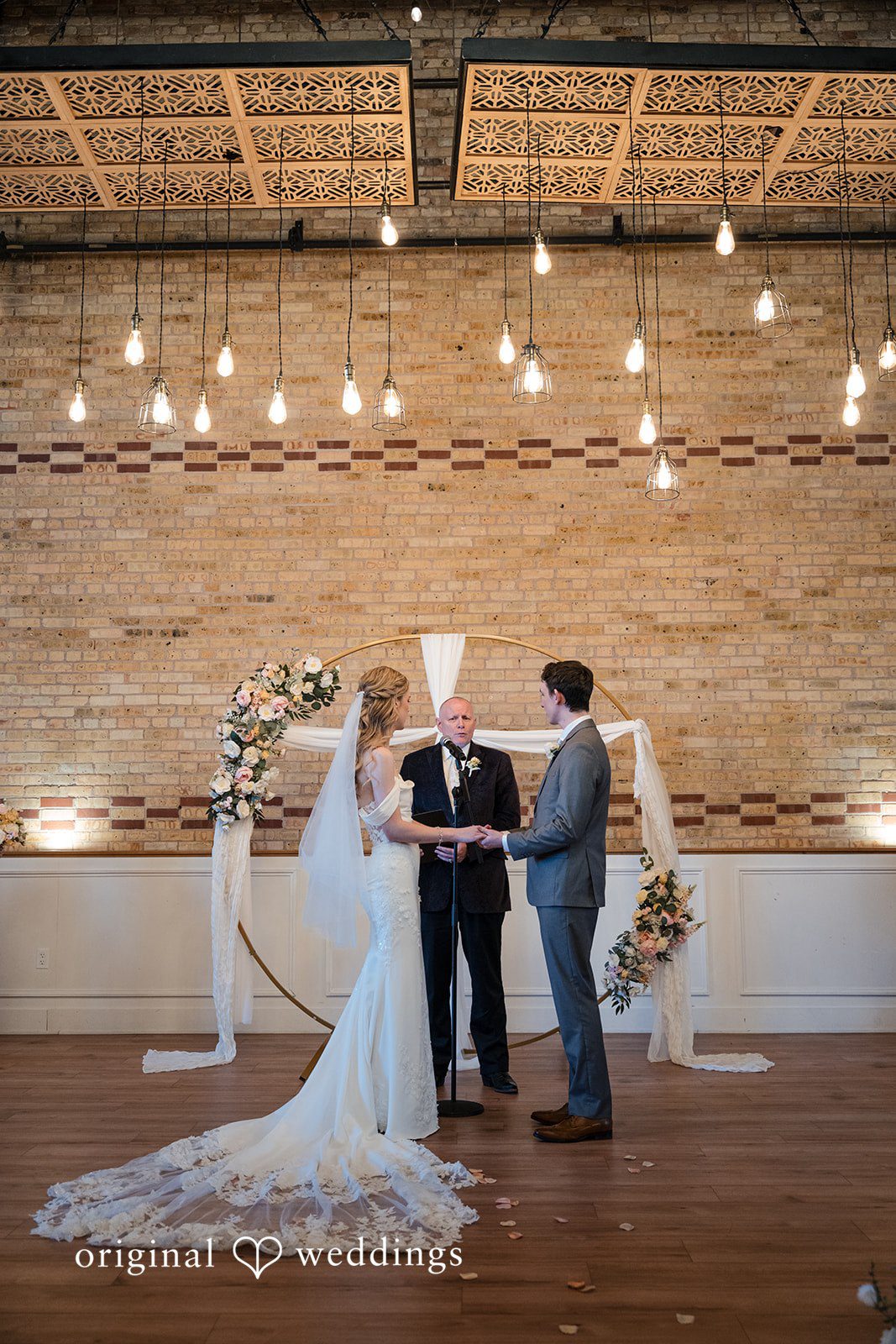 Bride and groom exchanging vows during the ceremony