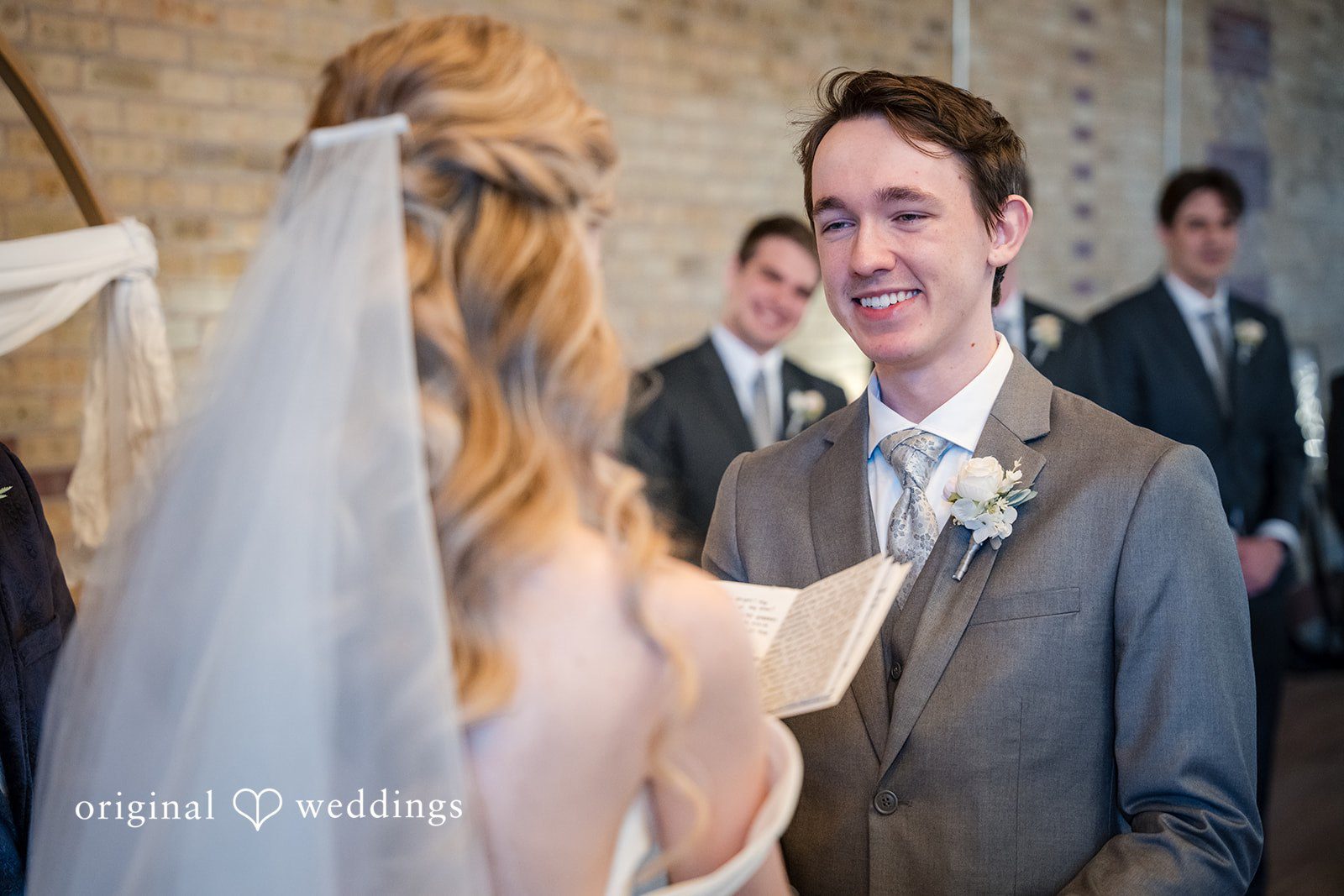 Bride reading her vows to the groom during the ceremony