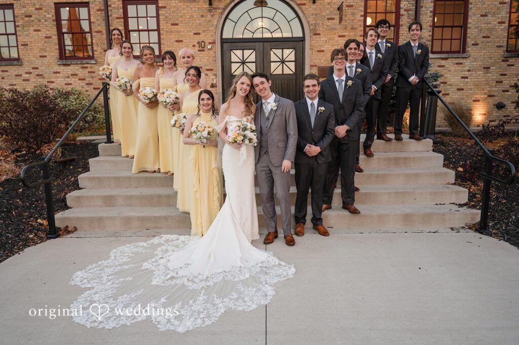 Ciara + Stephen Bride and groom posing with the full wedding party