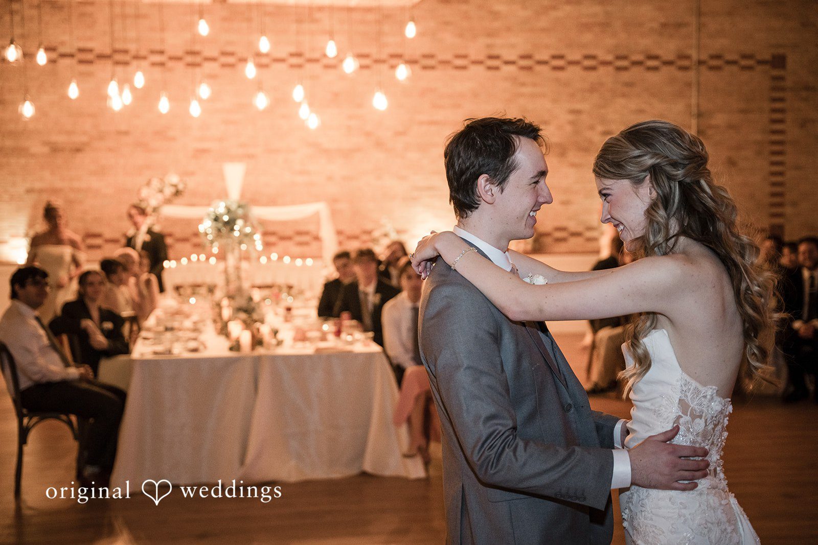 Couple sharing their first dance at the reception